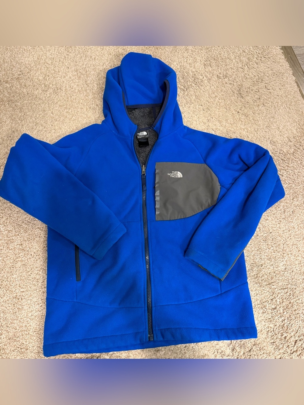 The North Face Kids Royal Blue Zip-Up Hoodie with Gray Chest Pocket